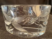 Full view of clear crystal candle holder with etched leaves