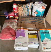 All items grouped: mortar bags, grout bag, grout boxes, automotive fluids