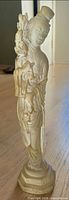 Full view of frosted glass Guanyin Buddha figurine on base