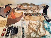 Group shot of entire lot: necklaces, belts, clip straps