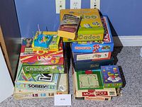 Two stacked columns of eleven identifiable boxed games