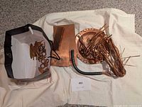 Overview of all copper items including bag with cuttings, plate, sheet, wires and cable