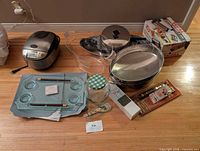 Group shot showing rice cooker, roasting pan, platters, sushi tray set, glass pieces and utensil