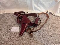 Full view of leather belt, holster, pouch and separate shoulder strap