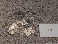 Overhead view of mixed U.S. nickels and dimes
