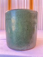Full exterior view of green glazed planter
