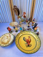 Group shot of all rooster-themed kitchenware and figurines