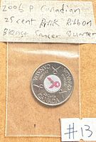 Coin in plastic sleeve with handwritten label