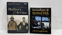 Front covers of both books standing upright