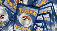 Stack of Pokémon cards showing backs
