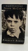 Front cover showing title, author, photograph of boy, Pulitzer reference