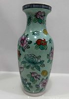 Full view of porcelain vase showing shape and floral design