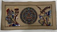 Full view of suede leather artwork showing calendar and two warriors
