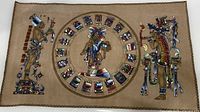 Full view of the suede leather painting showing calendar wheel and both deity figures