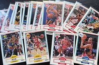 Spread of entire group of 1990-91 Fleer NBA trading cards showing quantity and player variety