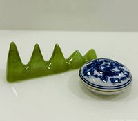 Green mountain-shaped brush rest and blue-white porcelain ink box together
