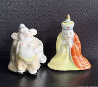 Front view of both Tang Monk and Pigsy figurines