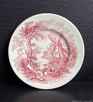 Front view of Palissy Ware red transfer "Windmill" plate
