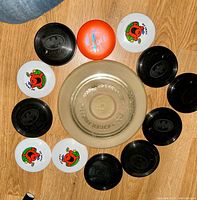 Top view of all eleven discs arranged around central Moonlighter disc