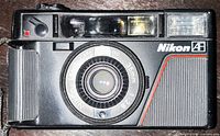 Front view of Nikon L35AF showing lens, flash, branding