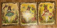 Front view of all three wood panel artworks