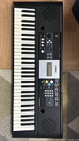 Top view of Yamaha PSR-E223 keyboard showing full keybed, speakers and controls