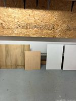 All four panels upright against wall