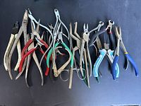 All 18 pliers and cutters laid out