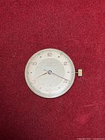 Front view of Record Watches Geneve dial with crown