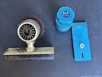All three items: vintage metal crystal lift on stand, blue A+F crystal lift, blue slotted plate