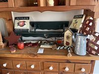 All items arranged on wooden hutch