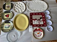 Overview showing all platters, plates, dipping bowls, glass lid