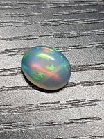 Top view of opal showing multicolored play of color