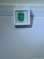 Emerald in display box front view