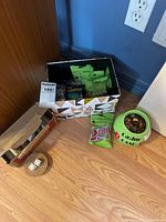 Overall view showing penny rolls, Casino Cash jar, decorative box with coin wrapper packs, and dice