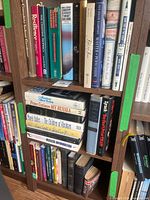 Full bookshelf showing majority of titles and bindings