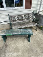 Both benches: cast-iron & wood bench behind wooden bench