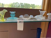 All six Fenton hobnail pieces displayed on shelf