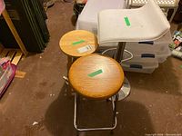 Overview of three bar stools showing materials and wear
