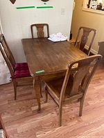 table and four chairs grouped