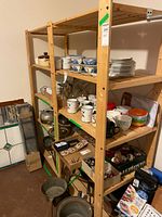 Full view of wooden shelving unit showing size and adjustable shelves