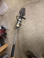 Full view of Bahco HS87 hydraulic cutter showing jaws, pump body and lever handle