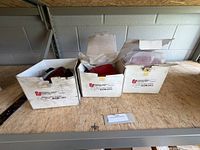 Three boxed Federal Signal GS2-R grille lights on shelf