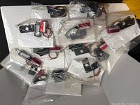 Overview of multiple sealed bags containing the lights and accessories