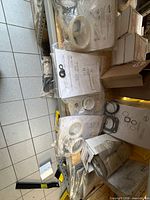 Shelf showing multiple HALE bagged kits with paperwork