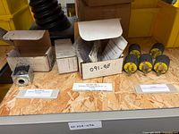 Solenoid, rebuild kit box and four connectors on shelf