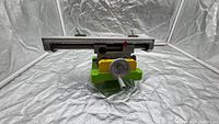Front angled view of BG-6350 X-Y table showing handwheel, base, and table