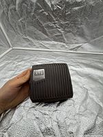 Front perspective of Parker IQAN XT2 ECU showing ribbed housing and branding badge