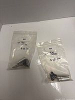 Both sealed bags containing the quick release pins