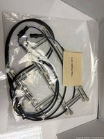 Overall view of sealed bag containing complete wire harness with connectors and sensor frames